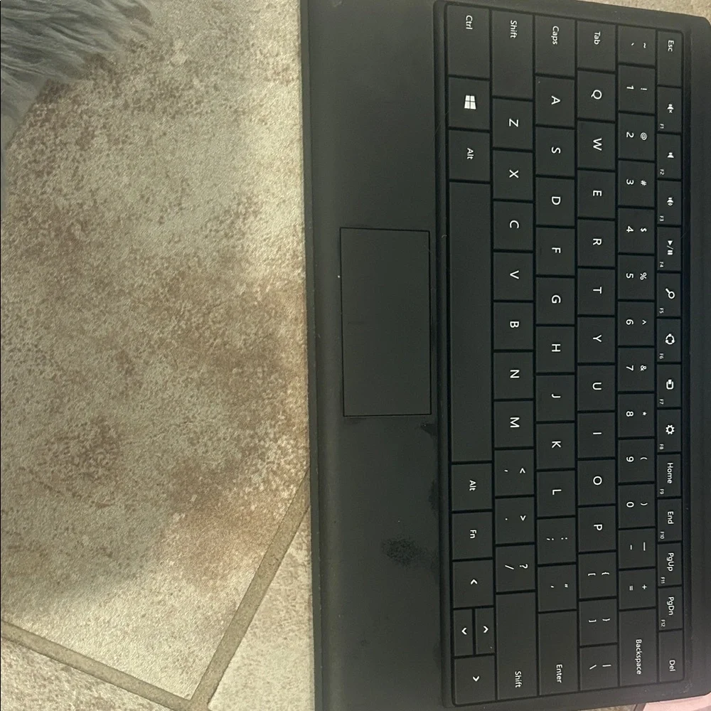 Microsoft Surface Laptop-Tablet in Black comes with charger